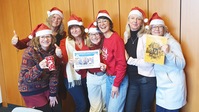 Das Team der Immanuel Beratung Zehdenick mit Weihnachtsmützen